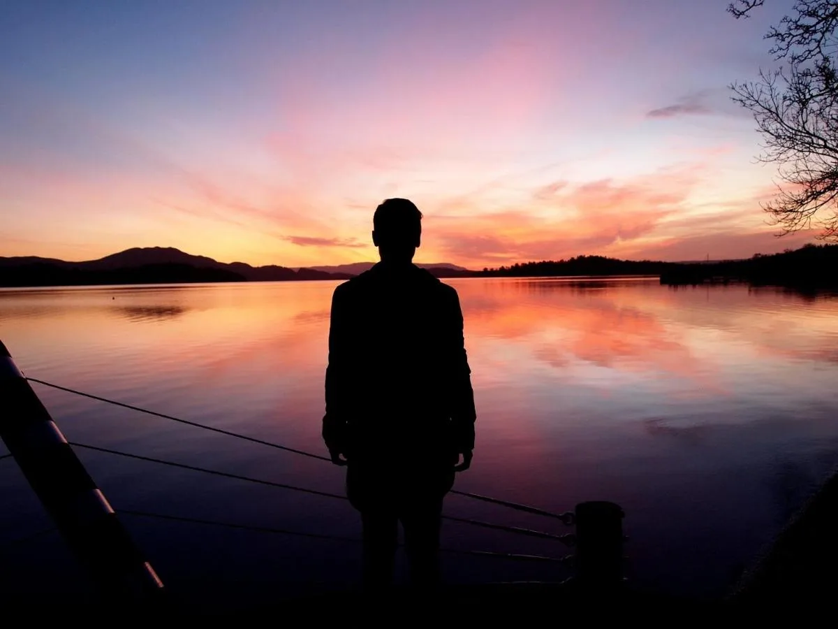 Silhouette at sunset on the loch